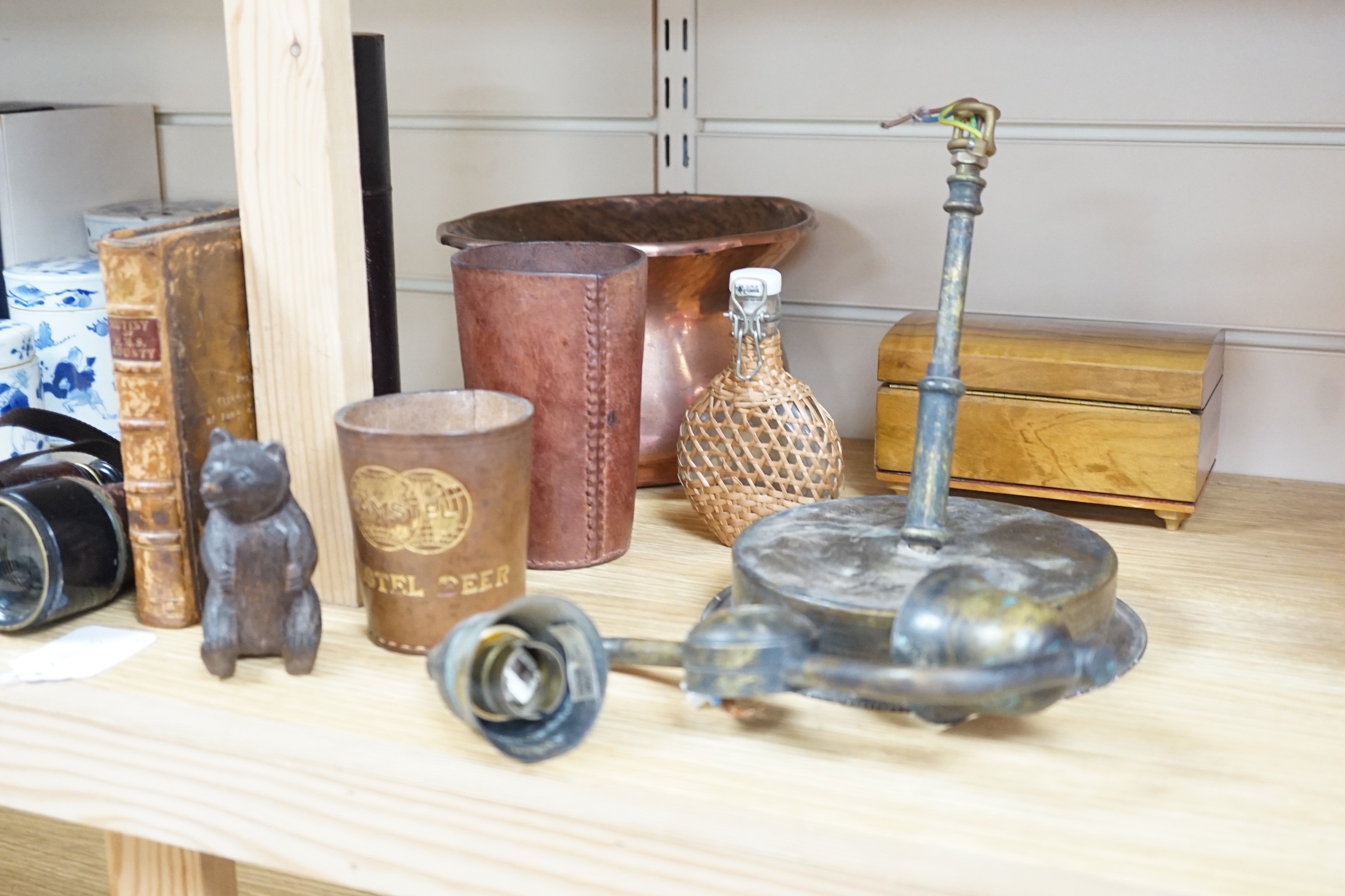 A quantity of collectables including a pair of Dolland of London binoculars, a Black Forest bear carving, a copper jardiniere, an olive wood jewellery box etc.